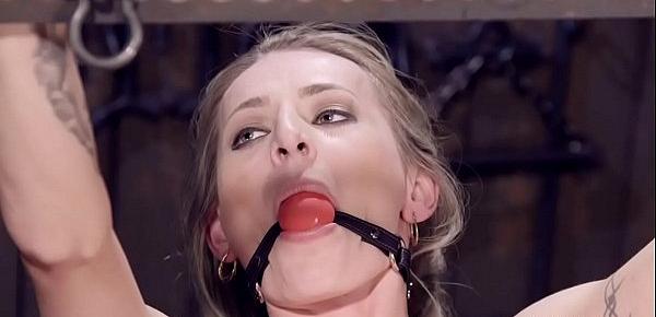  Gagged brunette tormented in device bondage